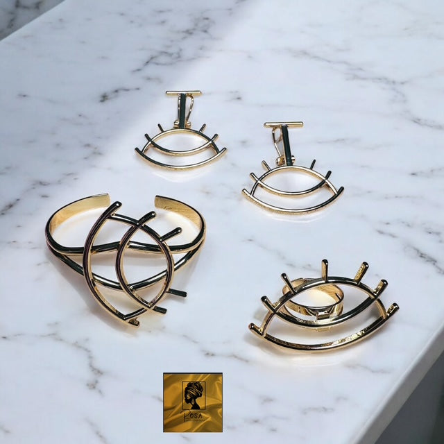 "THE EYES". Ensemble boucles d'oreilles , bague et bracelet